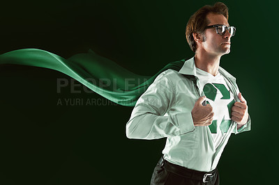 Buy stock photo Wind, businessman and superhero for recycling, sustainability and eco friendly for environment isolated on dark background. Male person, activist or environmentalist fearless for change in studio