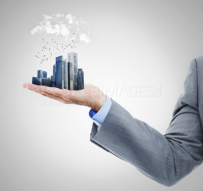 Buy stock photo Business man holding city in palm in studio for architecture, urban planning and real estate career. Buildings, investment and professional male person with town in hands for property development