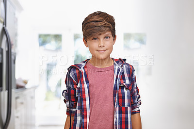 Buy stock photo Portrait of a smiling young boy in the kitchen