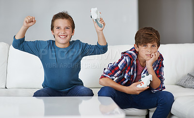 Buy stock photo Boys playing video game, celebrate and friends gaming with tech, esports and entertainment with winner. Gamer kids play games on console at home, happy with win and male children have fun together