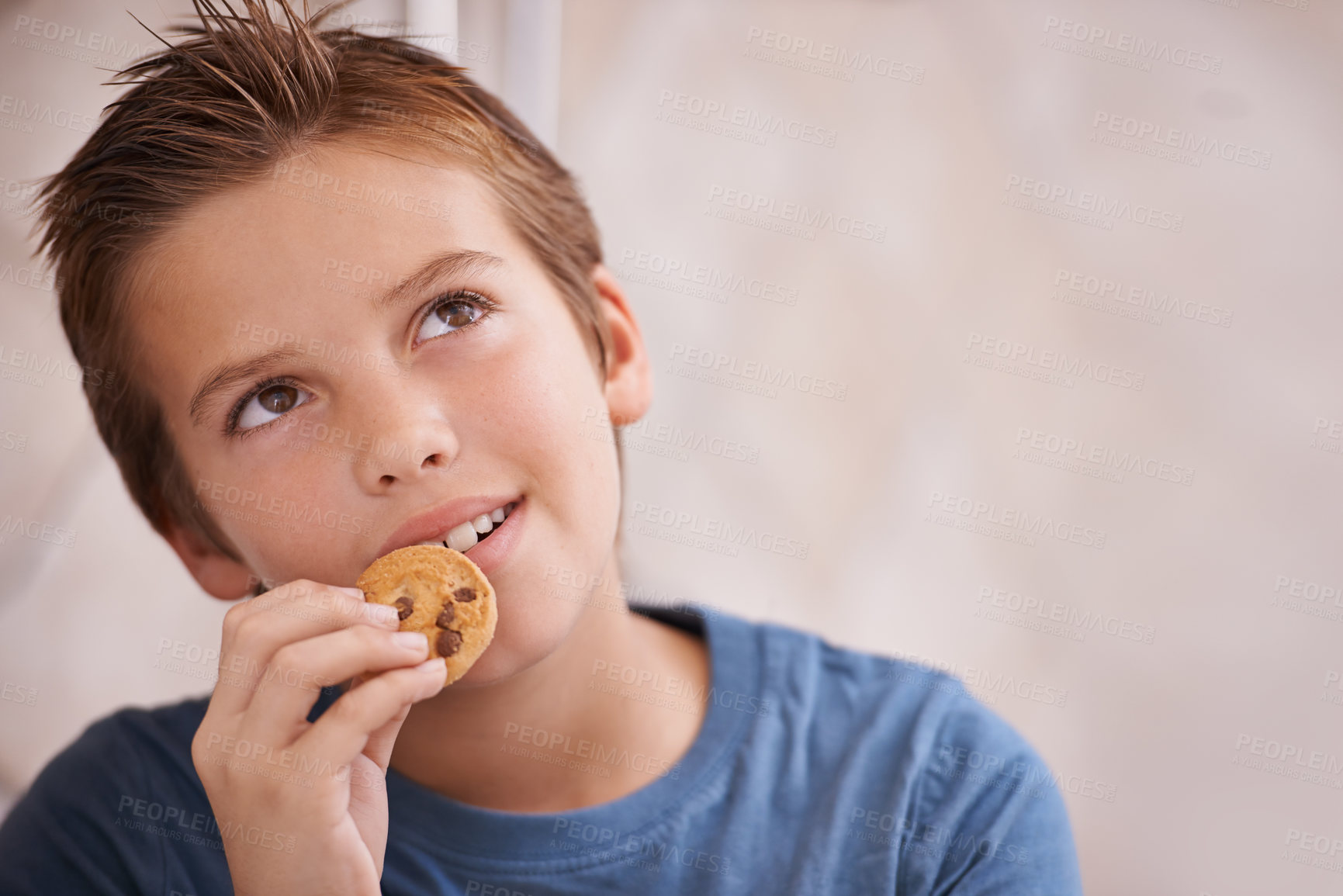 Buy stock photo Face, thinking any boy eating cookie in home for hunger, snack or treats inspiration. Future, planning or vision with happy young teen kid biting food, biscuit or baked goods in apartment closeup