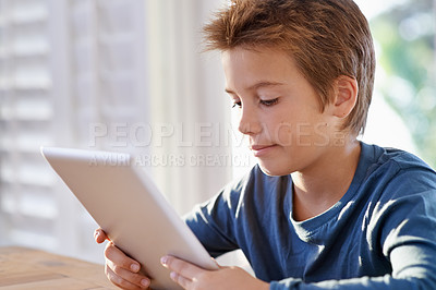 Buy stock photo Home, boy and tablet for education with online learning for child development, growth and study. Homework, internet and research with information for assignment or school project and deadline. 