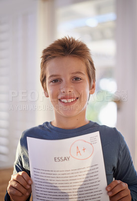 Buy stock photo Child, portrait and paper exam for education learning or student essay in home or scholarship, goals or academic. Male person, face and document pride or primary school studying, results or knowledge