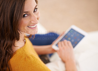 Buy stock photo Happy, portrait and woman with tablet on sofa reading ebook on app to relax on holiday or vacation in home. Girl, smile and lounge on tech with blog, article or news from search on internet in house