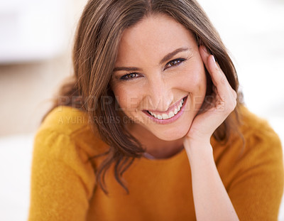 Buy stock photo Portrait of a woman sitting indoors resting her head on her hand