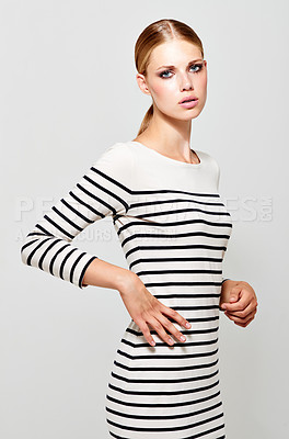 Buy stock photo Woman, dress stripes and fashion portrait with designer style in a studio. Isolated, white background and young female model with confidence and stylish youth wearing cosmetics and luxury dress