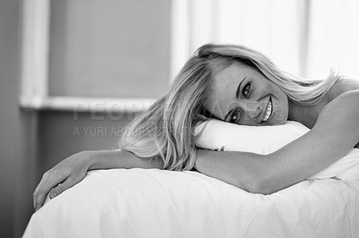 Buy stock photo Portrait, smile and woman in bed in home to relax or wake up in the morning in apartment in Sweden. Face, happy and young person in bedroom for resting, comfort or lying on black and white sheets