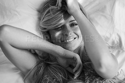 Buy stock photo Top view, smile and portrait of woman in bed at home in the morning on black and white. Face, above and happy person  in bedroom to relax, resting and wake up on comfortable pillow in Switzerland