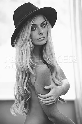 Buy stock photo Portrait, nude and body of woman in home for beauty, sexy and aesthetic of skin in Switzerland. Face, serious and topless female person in hat with confidence and naked in black and white apartment