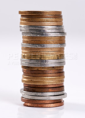 Buy stock photo Studio shot of a stack of coins on a white background