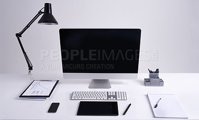 Buy stock photo Studio shot of an organized office workstation