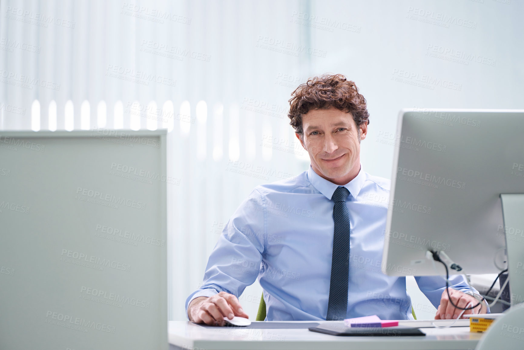 Buy stock photo Man, office and portrait with computer and desk, happy and confident corporate male person sitting in workspace. Technology, digital search administrator and smile, browse internet on business pc