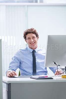 Buy stock photo Man, office and portrait with pc and desk, happy and confident corporate male person sitting in workspace. Technology, digital search administrator and smile, browse internet on business computer