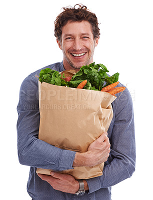 Buy stock photo Studio, smile or portrait of man with groceries on promotion, sale or discounts deal for nutrition. Happy, delivery offer and male person with healthy food for cooking, organic fruits or diet choice