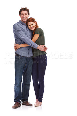 Buy stock photo Full-length shot of a beautiful couple embracing isolated on white