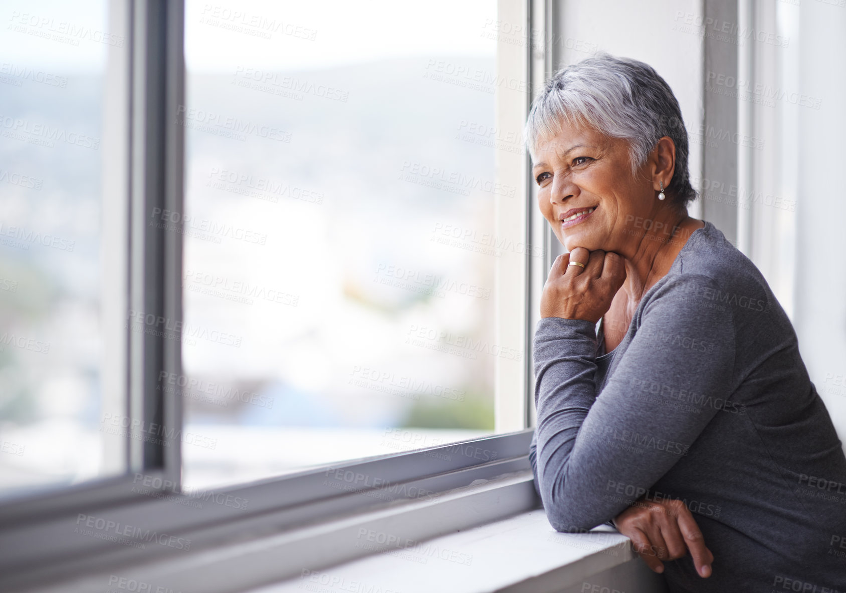 Buy stock photo Window, senior woman and thinking with smile, home and retirement with peace and problem solving. Old person, elderly lady and pensioner with view or happiness with nostalgia and solution with choice