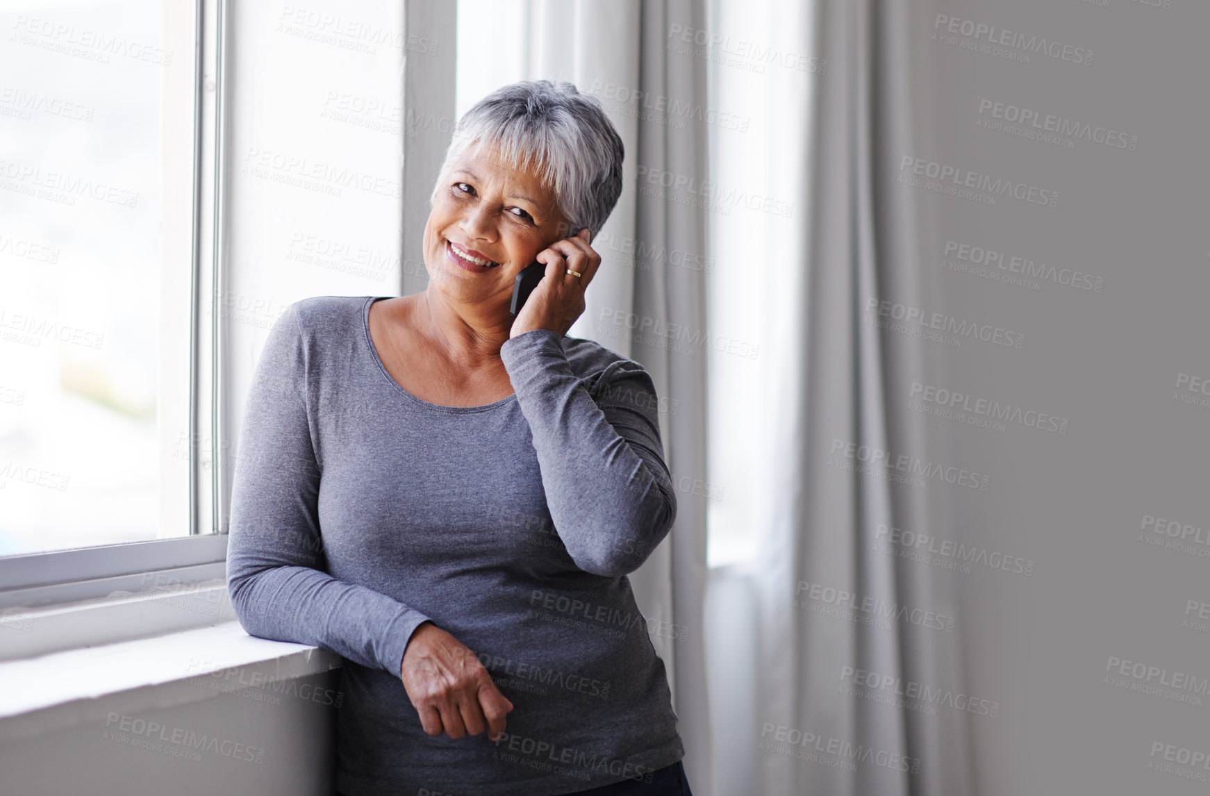 Buy stock photo Phone call communication, smile and elderly woman talking, consulting and chat on mobile conversation, discussion or networking. Listening, relax and senior person talk to cellphone contact in Mexico