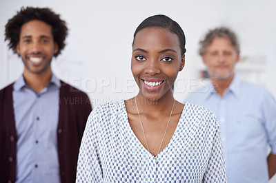 Buy stock photo Woman, smile and portrait in office with colleagues for collaborartion, research and career for organisation, agency or company. Diverse, team and coworkers for planning, teamwork and profession