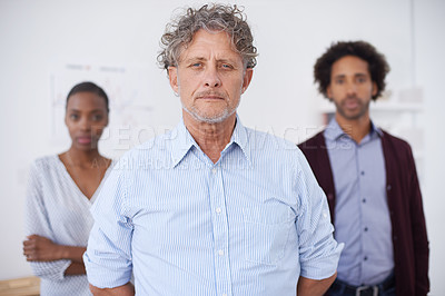 Buy stock photo Man, coworker and portrait in office with colleagues for collaboration, research and career for organisation, agency or company. Diverse team or engineer with mentor for meeting and teamwork indoor 
