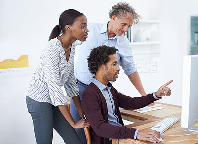 Buy stock photo Coworkers, team and computer in office for web design, brainstorm and research for business. Diverse group or people and point with tech for info or advice together with technology and internet