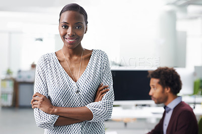 Buy stock photo Portrait of a young business woman standing with her arms crossed