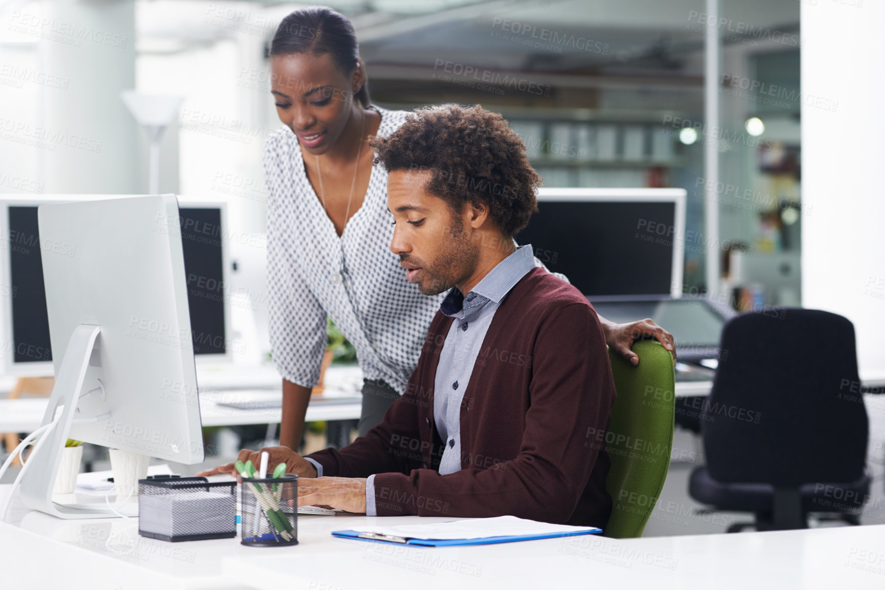 Buy stock photo Coworker, computer and desk in office for research, collaboration or career in company for work or profession. Intern or employee with mentor and tech for internet, help or guide for online indoor 