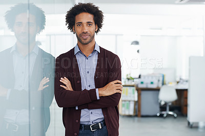 Buy stock photo Portrait of a businessman standing with his arms crossed