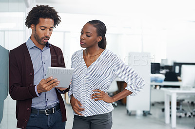 Buy stock photo Collaboration, research and tablet with business people in office together for project management. Meeting, teamwork or technology with young black man and woman employee in workplace for discussion 