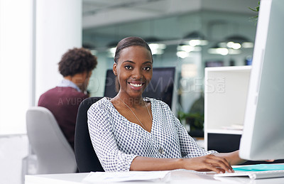 Buy stock photo African woman, portrait and computer in office with smile, typing and pride for project at startup company. Black person, employee and happy with pc for writing proposal at creative media agency