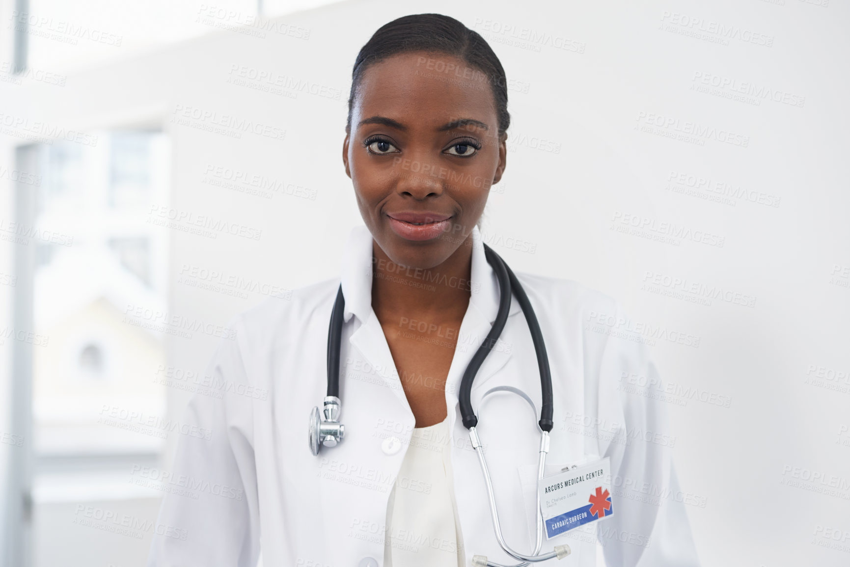 Buy stock photo Portrait, healthcare and female doctor with stethoscope, smile and radiology in hospital. Medical, wellness or lab coat for professional physician from Nigeria, neurology or woman surgeon in medicine