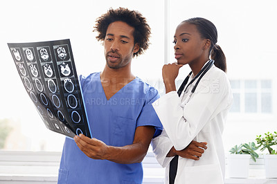 Buy stock photo Doctor, nurse and study xray for health, collaboration for surgery and treatment plan with anatomy. Black people review abdominal CAT scan, MRI or radiology, medicine and surgeon with team at clinic