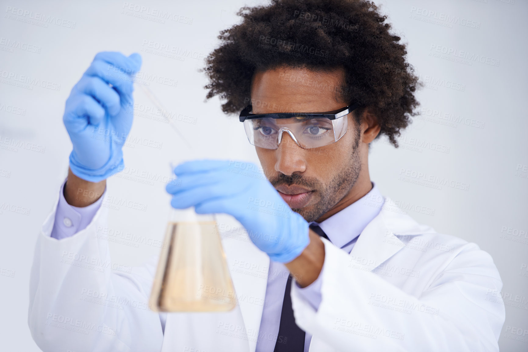 Buy stock photo Man, pipette and flask for science in laboratory, experiment and liquid for biochemistry in container. Black male person, doctor and research for breakthrough, solution and process for medical study