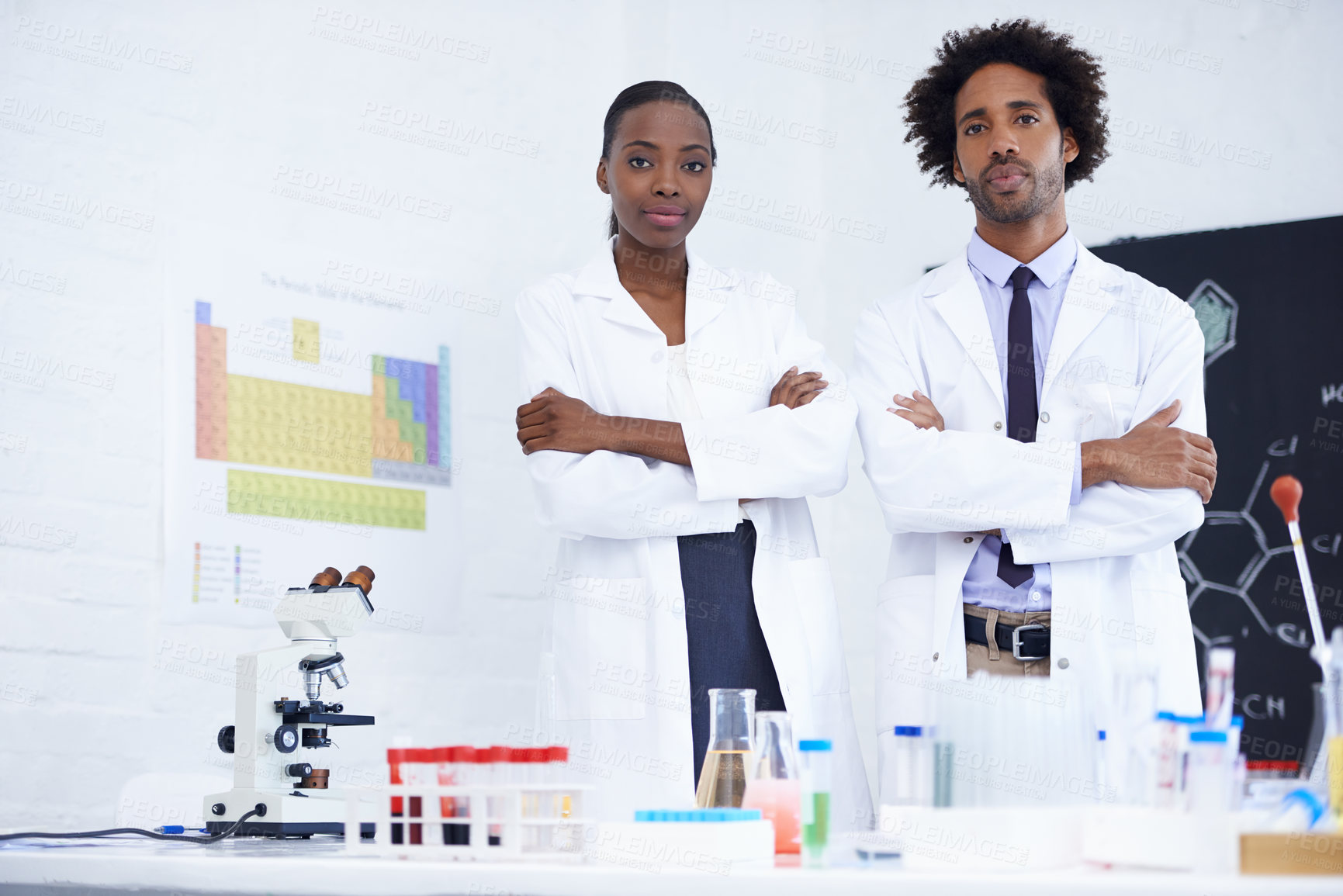 Buy stock photo Scientist, coat and portrait in lab for teamwork, chemistry and experiment with molecule, cylinder and microscope. Young people or colleague with medical research, biology or test for pathology    