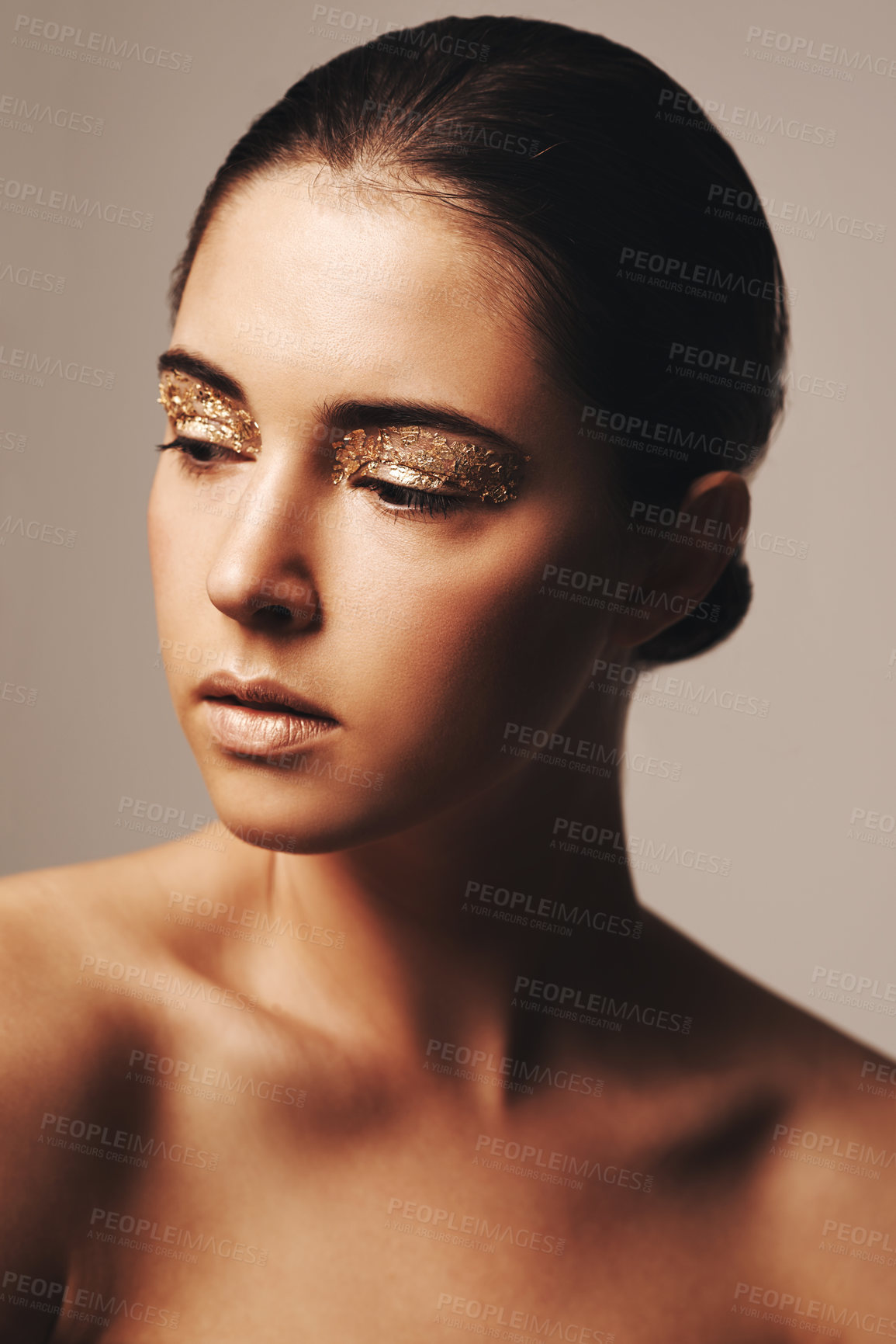 Buy stock photo Gold glitter, beauty and woman with eyeshadow, makeup and cosmetology with shimmer for shine on beige background. Glamour, sparkle and fashion model in studio, cosmetics and elegance with creativity
