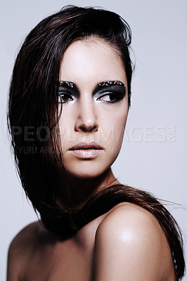 Buy stock photo Woman, smokey and eyes with makeup in studio for art and beauty, thinking and wondering with thoughts for cosmetics. Female person, isolated and white background with eyeshadow or cosmetology.