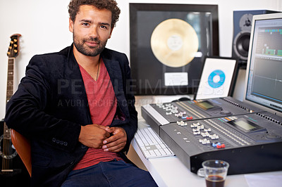 Buy stock photo Portrait, man and working in recording studio for sound production, audio engineering and dj equipment. Young guy, producer and musician at amplifier to play song, entertainment and radio technician