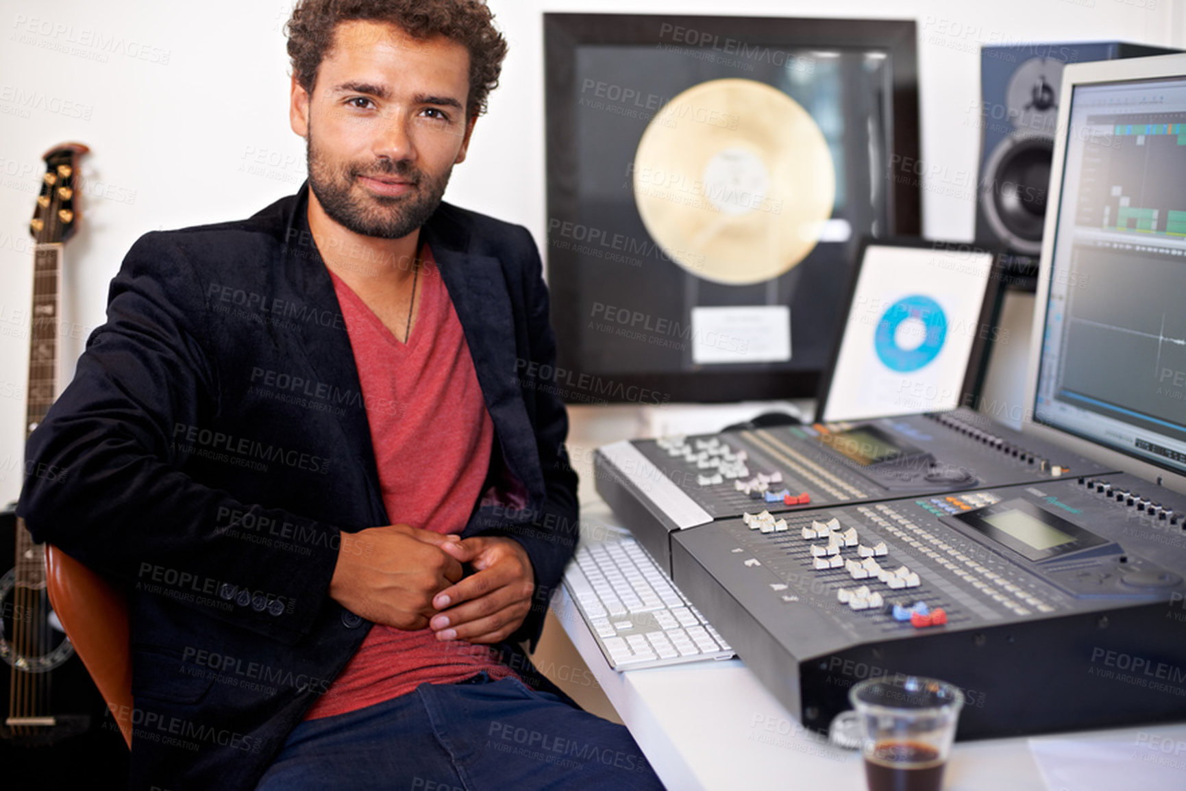 Buy stock photo Portrait, man and working in recording studio for sound production, audio engineering and dj equipment. Young guy, producer and musician at amplifier to play song, entertainment and radio technician