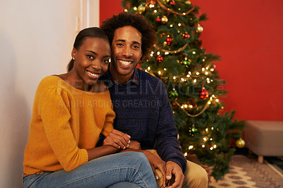 Buy stock photo Couple, portrait and Christmas holiday at tree in home or vacation connection for festive season, love or decoration. Man, woman and face with lights in winter or marriage celebration, relax or break