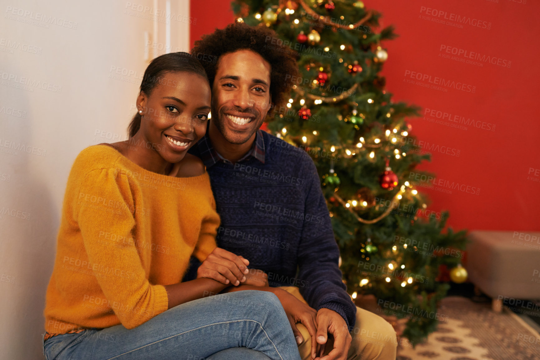 Buy stock photo Couple, portrait and Christmas holiday at tree in home or vacation connection for festive season, love or decoration. Man, woman and face with lights in winter or marriage celebration, relax or break