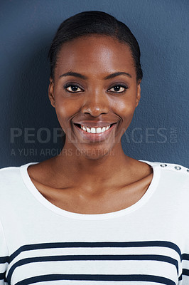 Buy stock photo Black woman, happy portrait and studio for natural cosmetics for skincare and facial glow for beauty. African model, dermatology or smile face with mascara or confident in closeup by blue background