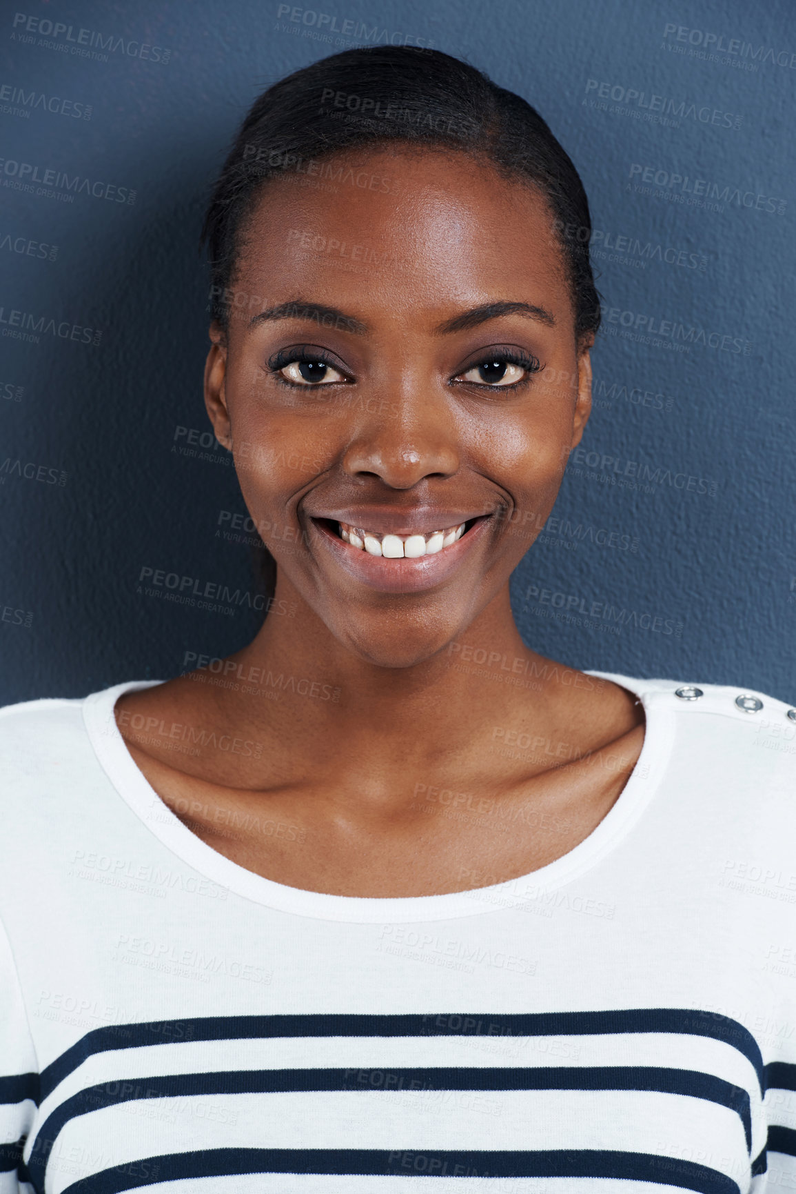 Buy stock photo Black woman, happy portrait and studio for natural cosmetics for skincare and facial glow for beauty. African model, dermatology or smile face with mascara or confident in closeup by blue background