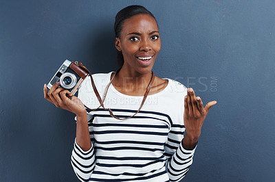 Buy stock photo Black woman, portrait and question in studio for photography and problem solving with hand gesture. African face, vintage camera and creative professional for confused in mockup by blue background