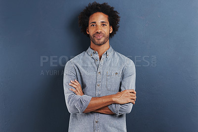 Buy stock photo Happy man, portrait and arms crossed in studio as professional, confident and fashion by blue background. African person, face and smile for ambition as designer and creativity or pride in mock up