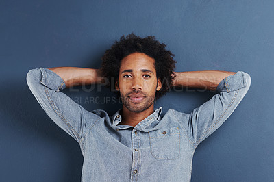 Buy stock photo Happy man, portrait and trendy fashion in studio as creative person and casual clothes by blue background. Brazil model, face or positive in gen z aesthetic or denim shirt, relax or funky in close up