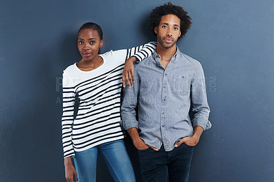 Buy stock photo Fashion, portrait and cool black couple in studio with love and support on gray background together with pride. African, people and casual clothes or confident in style on date with wall mockup space