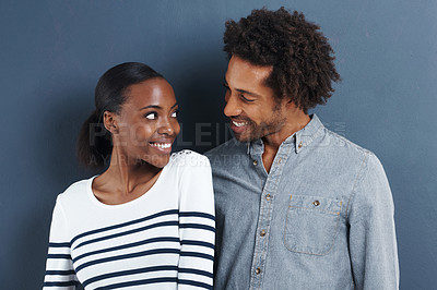 Buy stock photo Happy, portrait and black couple smile with love on studio background together in cool fashion. African, people and relax with partner in profile picture with casual style and clothes on mockup space