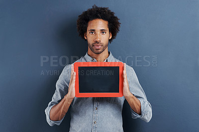 Buy stock photo Portrait, man or blackboard with mockup in studio for news, announcement or offer on blue background. Frame, presentation or face of guy model show space for promotion, info or sign up, guide or deal