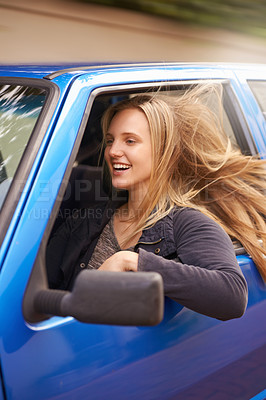 Buy stock photo Transport, travel and woman with wind in car for adventure, journey and commute on street. Road trip, happy and excited person in vehicle for fun, driving and relax for vacation, freedom and holiday