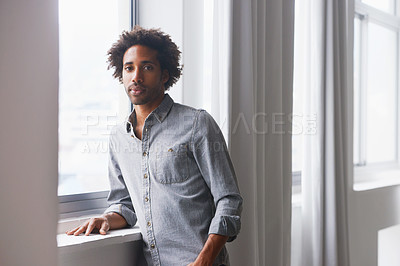 Buy stock photo Man, serious or portrait at window by new house for relax, property investment or homeownership in lounge. African tenant, person or confident face in living room for relocation, dream home or moving