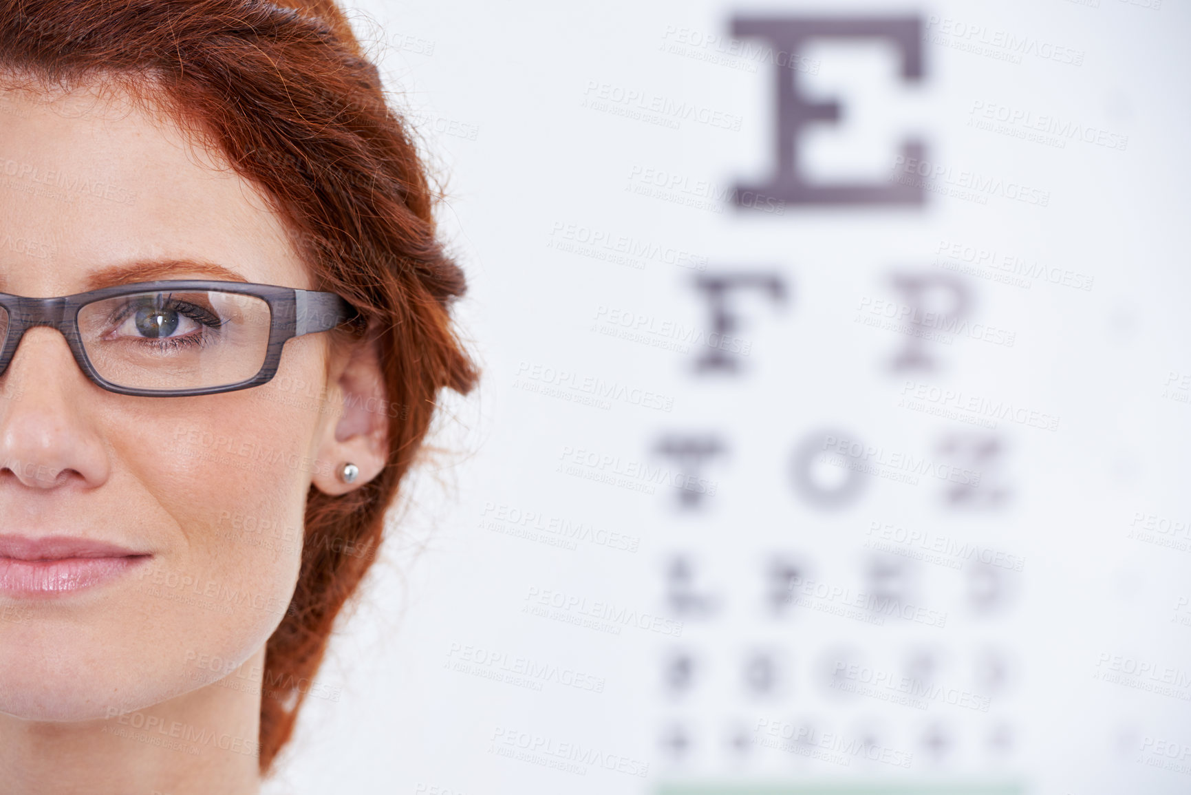 Buy stock photo Woman, glasses and eye chart or vision consultation or prescription lens for eyewear health, examination or checkup. Female person, frame and optical test or wellness or letters, diagnosis or reading